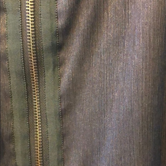 Slightly shimmering and a fluffy neckline - Picture 6 of 7